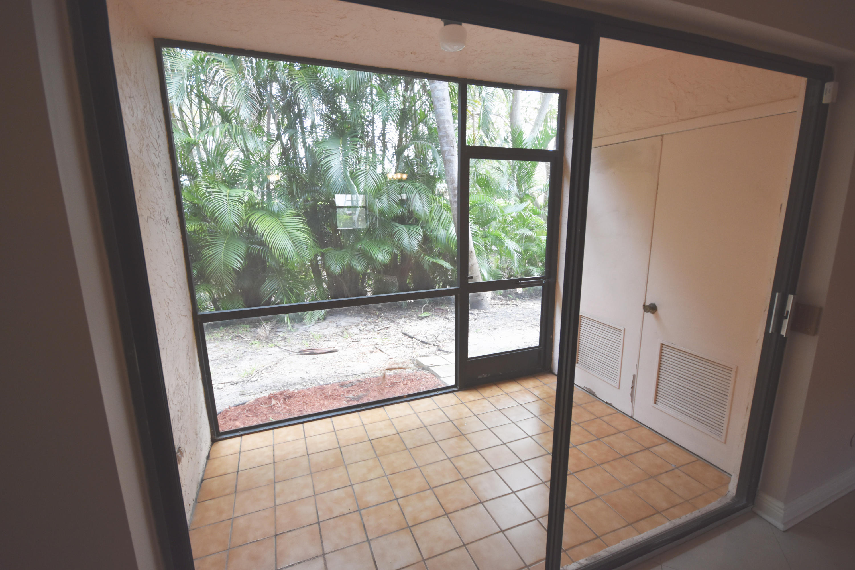 22064 Palms Way, Unit 103 Boca Raton, FL 33433 - Photo 14 of 16 Screened Patio
