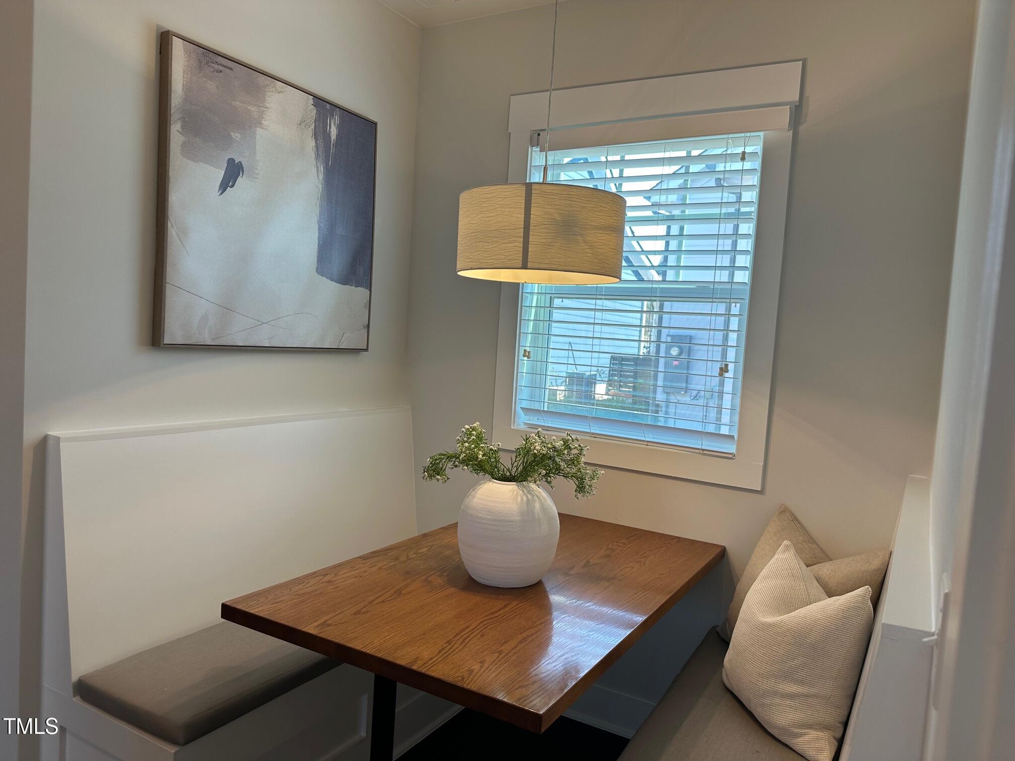 54 Cottage Way Pittsboro, NC 27312 - Photo 12 of 22 a view of a dining room with furniture and window