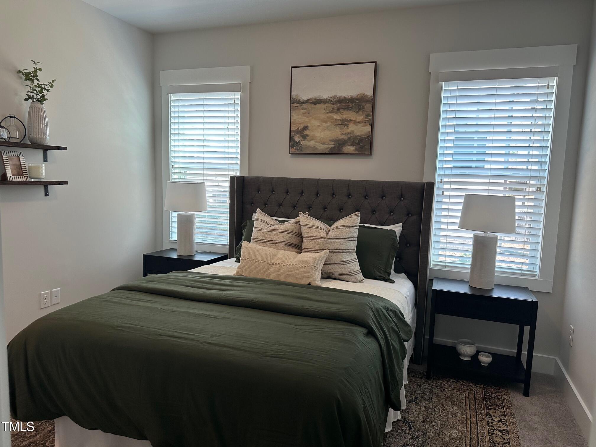 54 Cottage Way Pittsboro, NC 27312 - Photo 14 of 22 a bedroom with a bed and a window