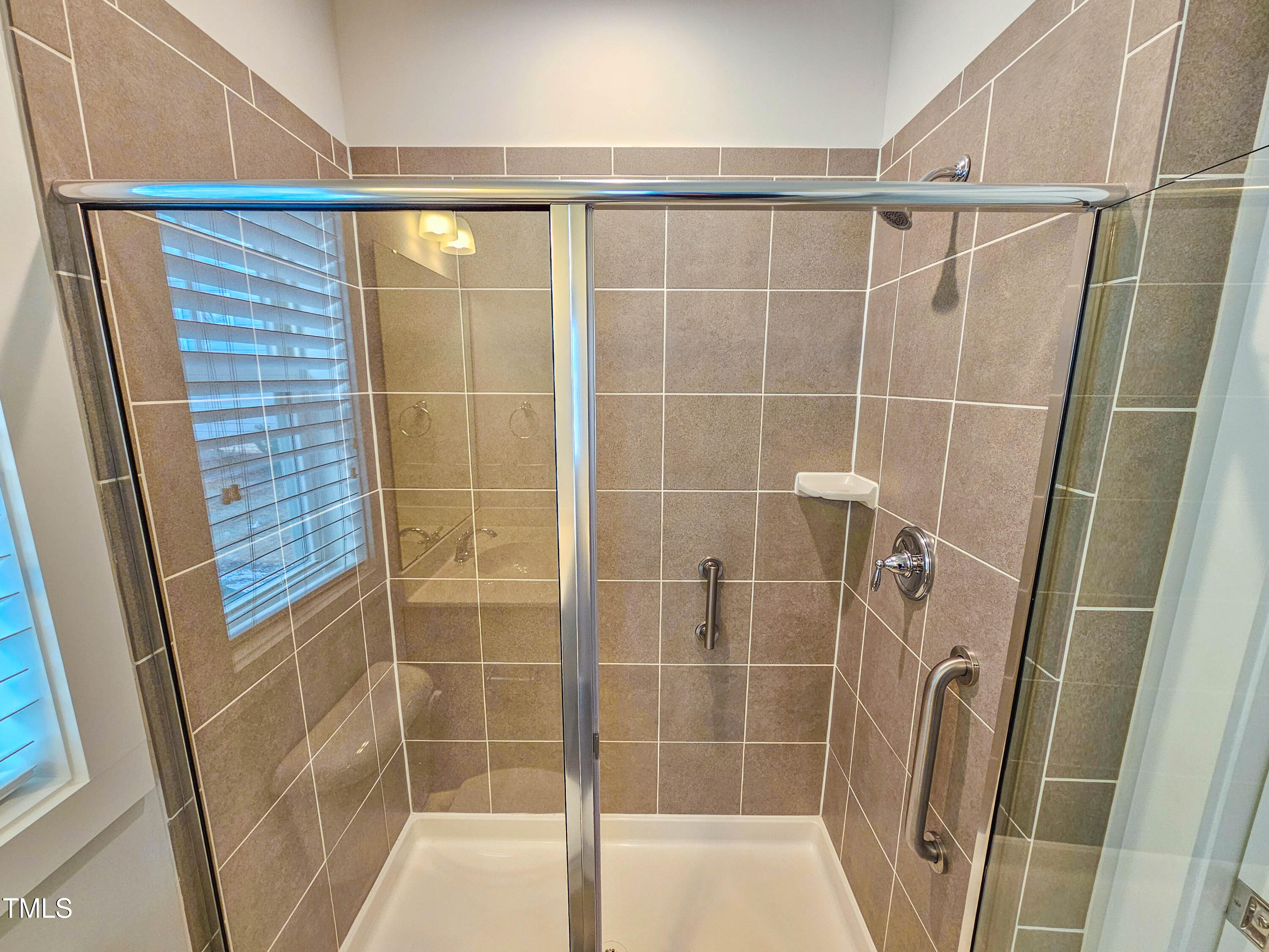 54 Cottage Way Pittsboro, NC 27312 - Photo 18 of 22 a bathroom with a shower and a sink