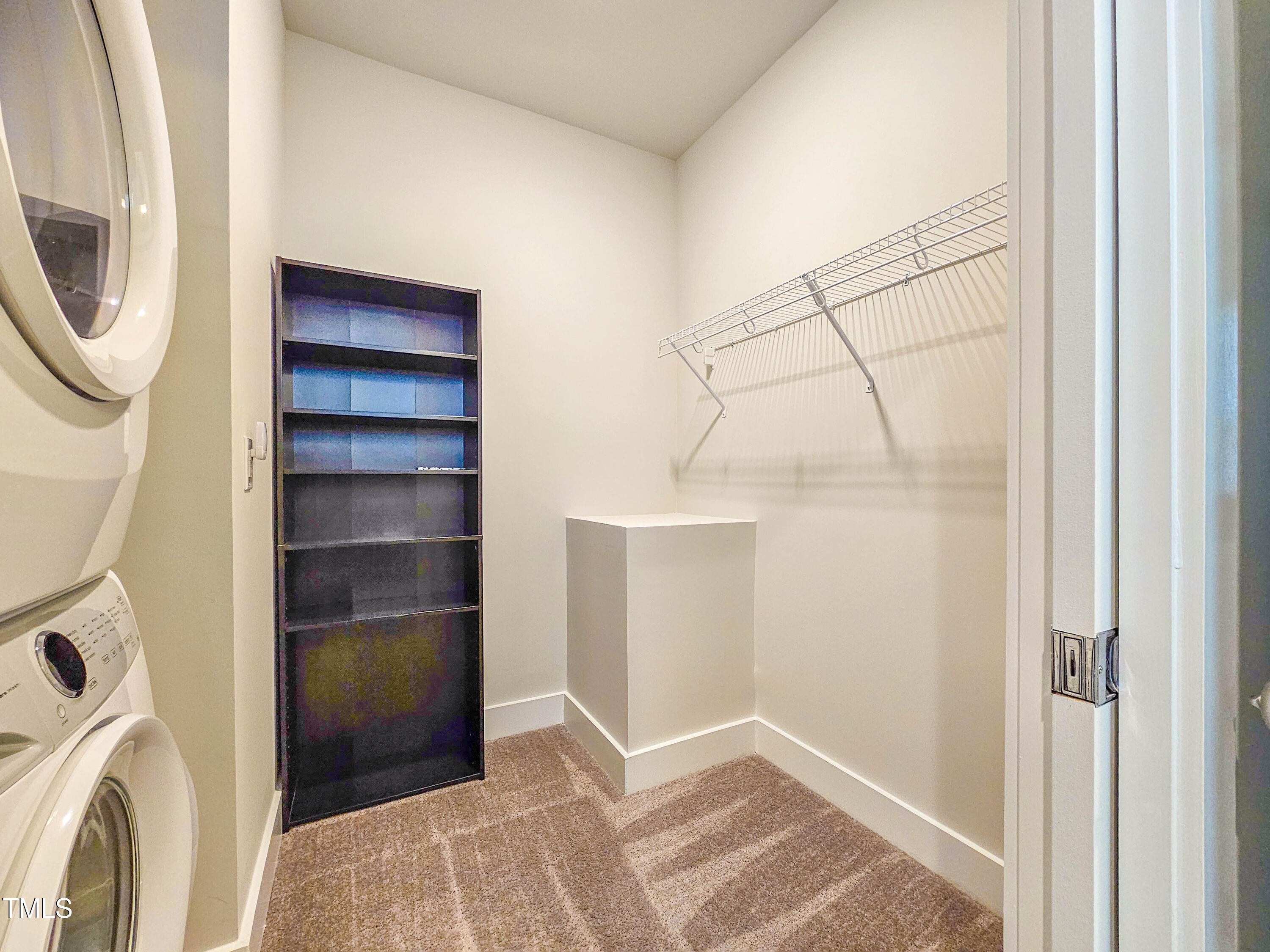 54 Cottage Way Pittsboro, NC 27312 - Photo 20 of 22 a view of walk in closet with empty racks