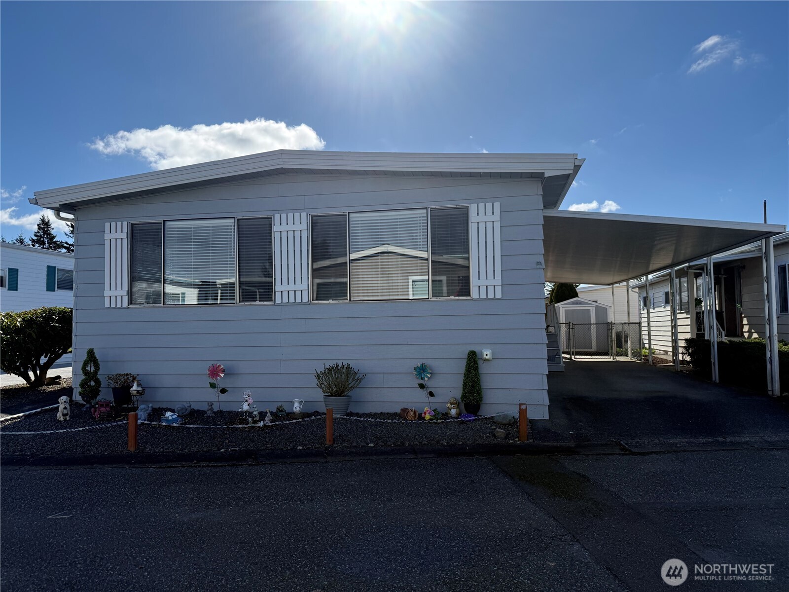 1415 84th Street Southeast, Unit 83 Everett, WA 98208 - Photo 1 of 34 a view of house with yard