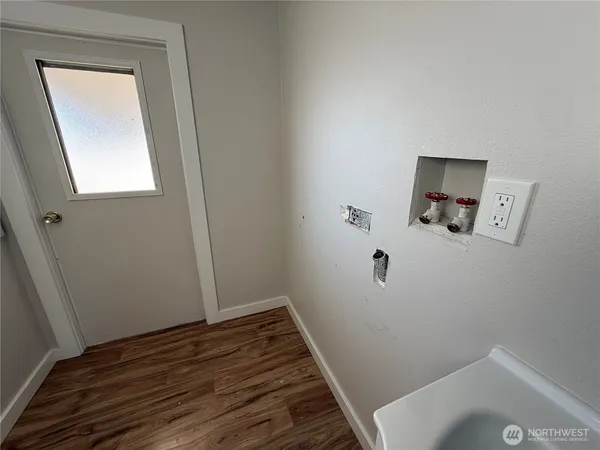 a bathroom with a toilet and a sink