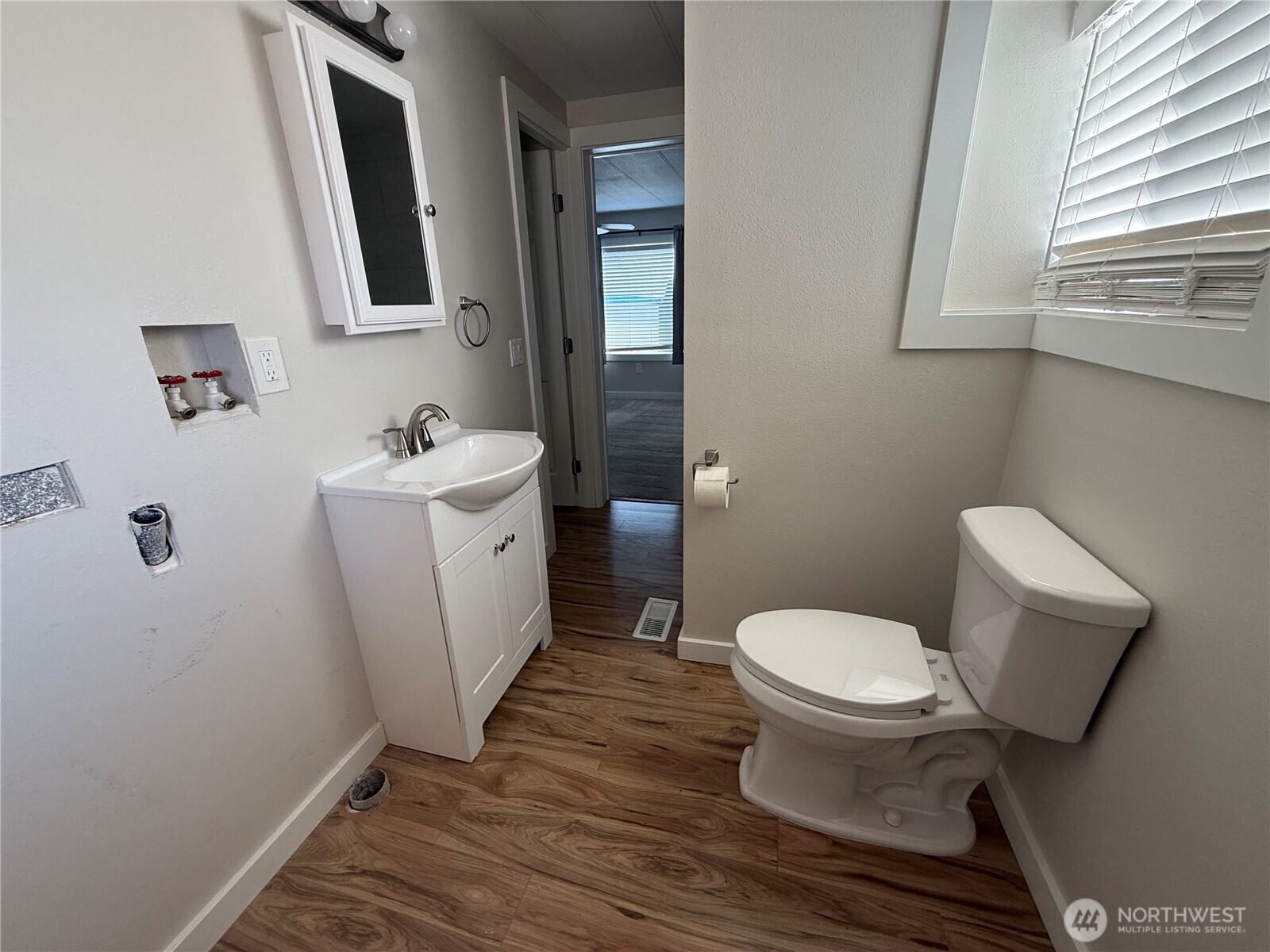 1415 84th Street Southeast, Unit 83 Everett, WA 98208 - Photo 21 of 34 a bathroom with a toilet and a sink