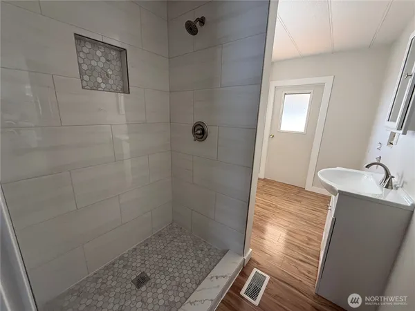 a view of an empty room with a window