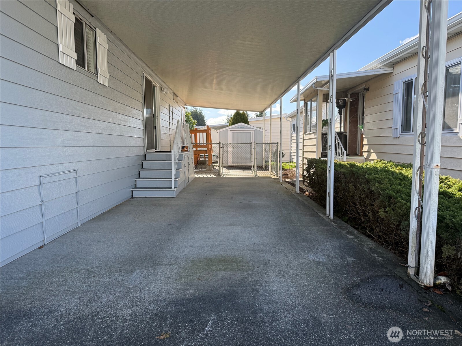 1415 84th Street Southeast, Unit 83 Everett, WA 98208 - Photo 3 of 34 a view of a house with a patio