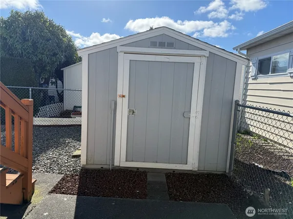 a view of a house with a wooden door