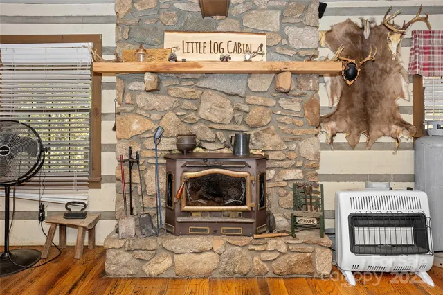 a kitchen with stainless steel appliances granite countertop a refrigerator sink and stove