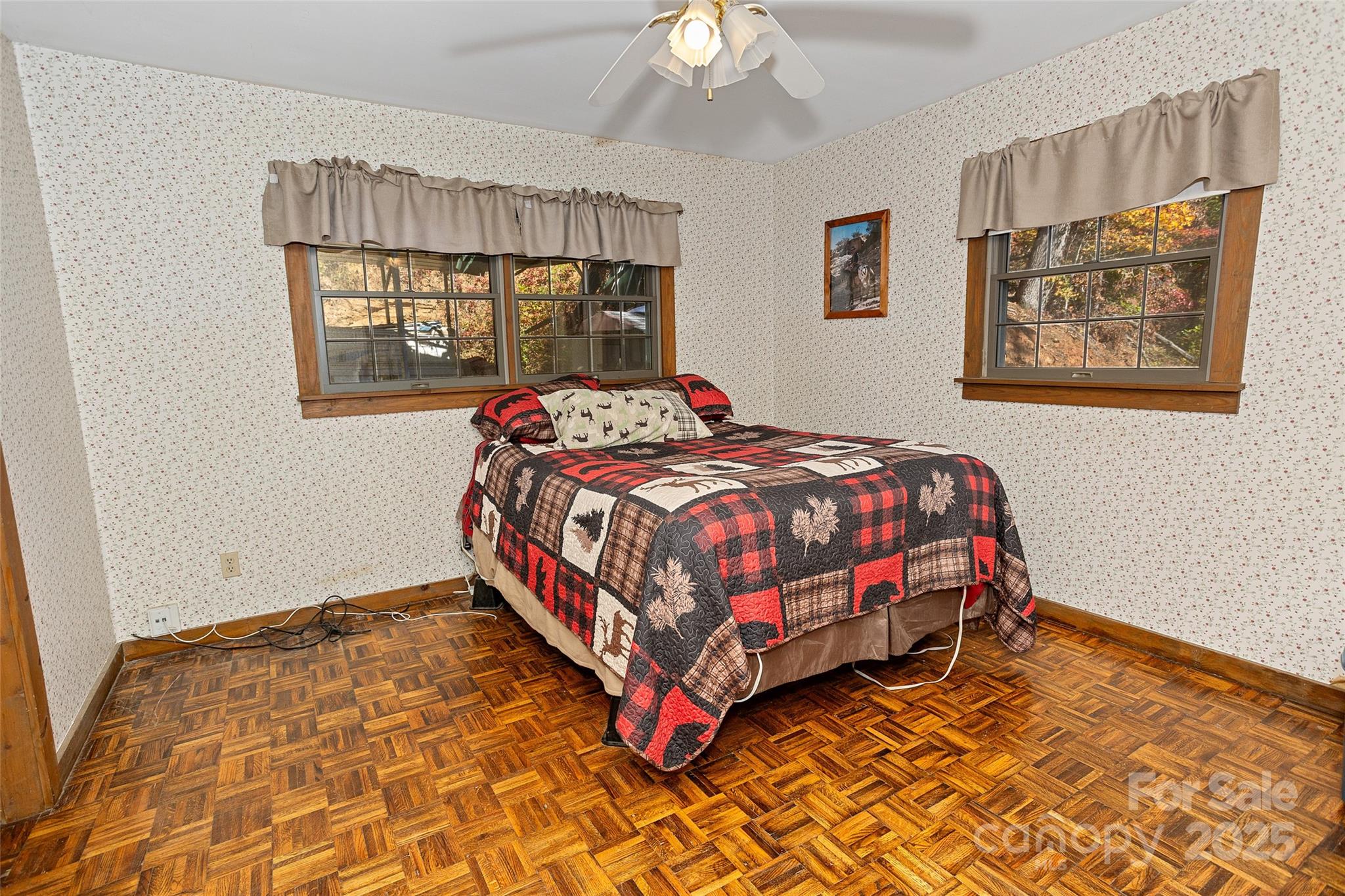 310 Log Gap Road Fairview, NC 28730 - Photo 27 of 46 a bedroom with a bed and window