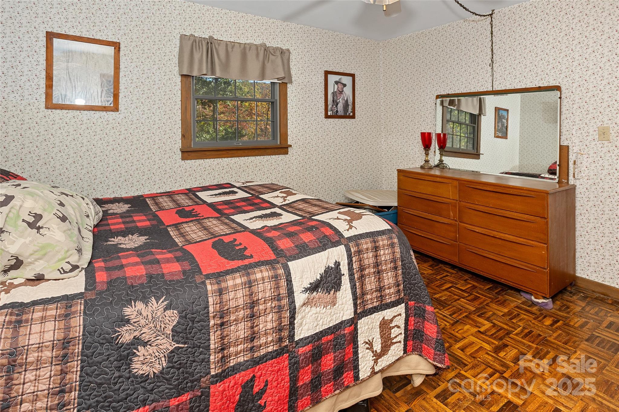 310 Log Gap Road Fairview, NC 28730 - Photo 28 of 46 a bedroom with bed and a mirror