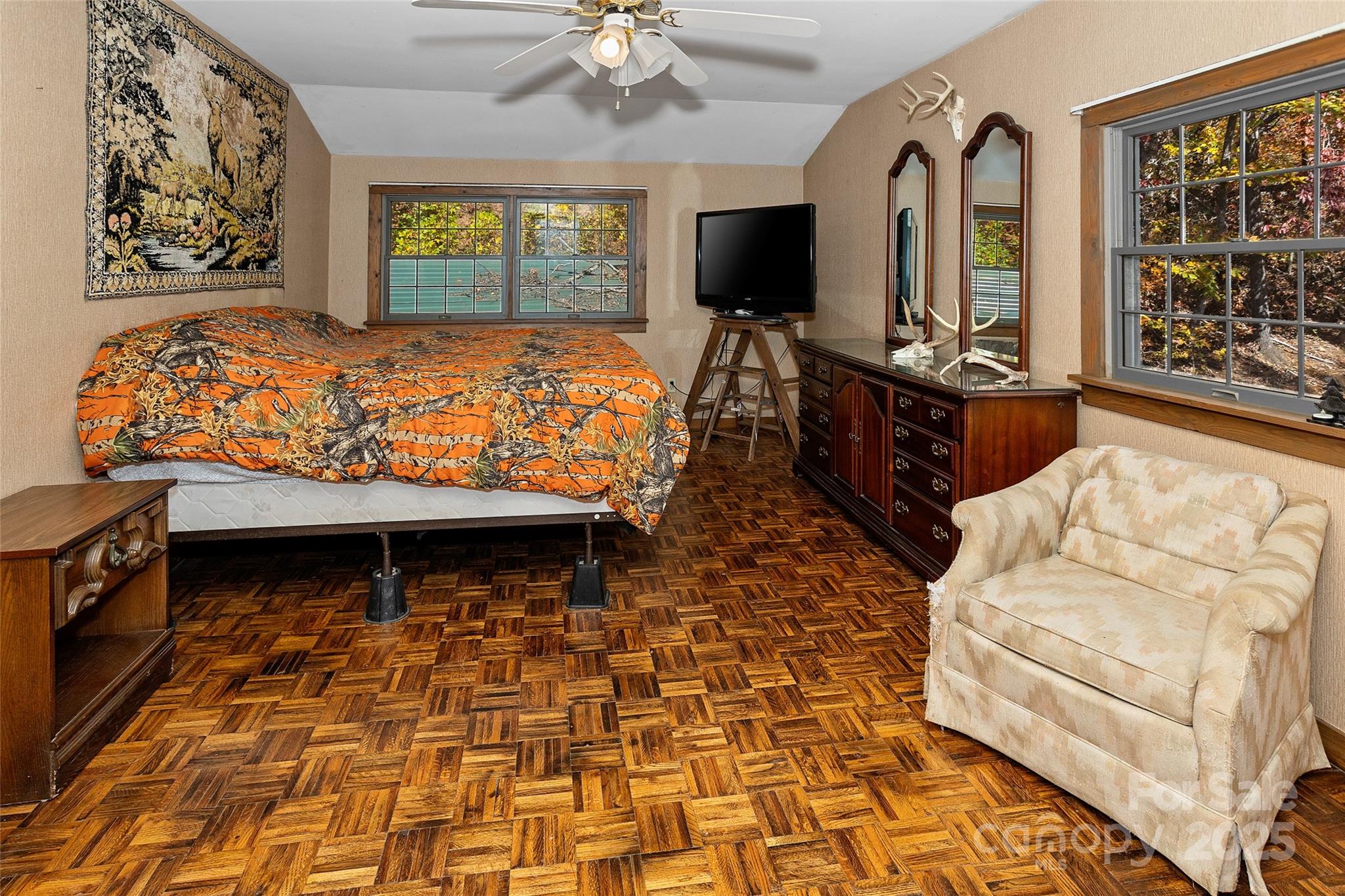 310 Log Gap Road Fairview, NC 28730 - Photo 32 of 46 a bed room with a bed and a television
