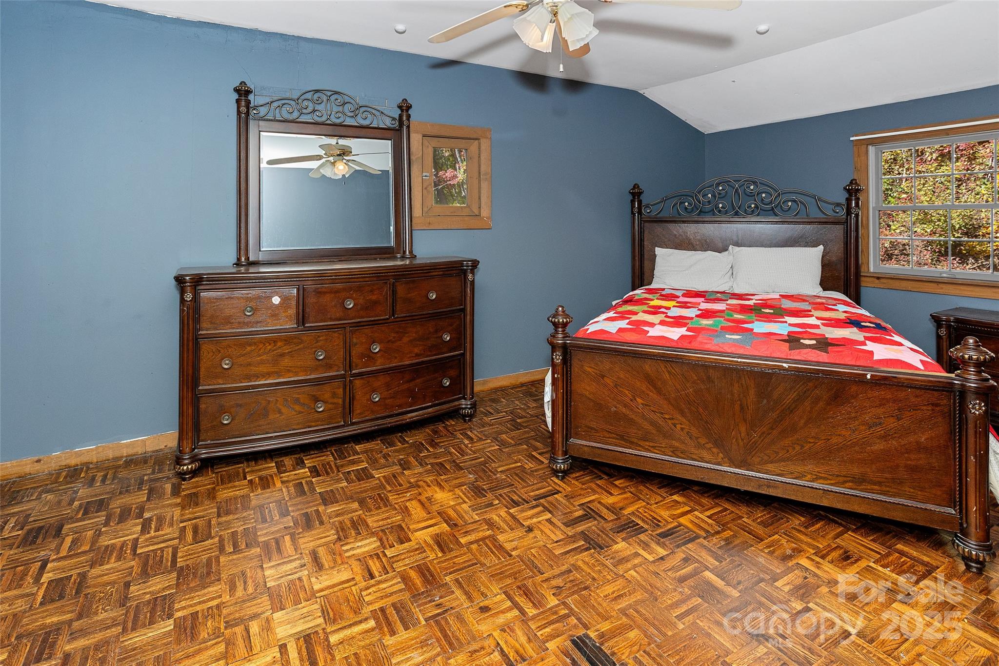 310 Log Gap Road Fairview, NC 28730 - Photo 35 of 46 a bedroom with a bed and a dresser