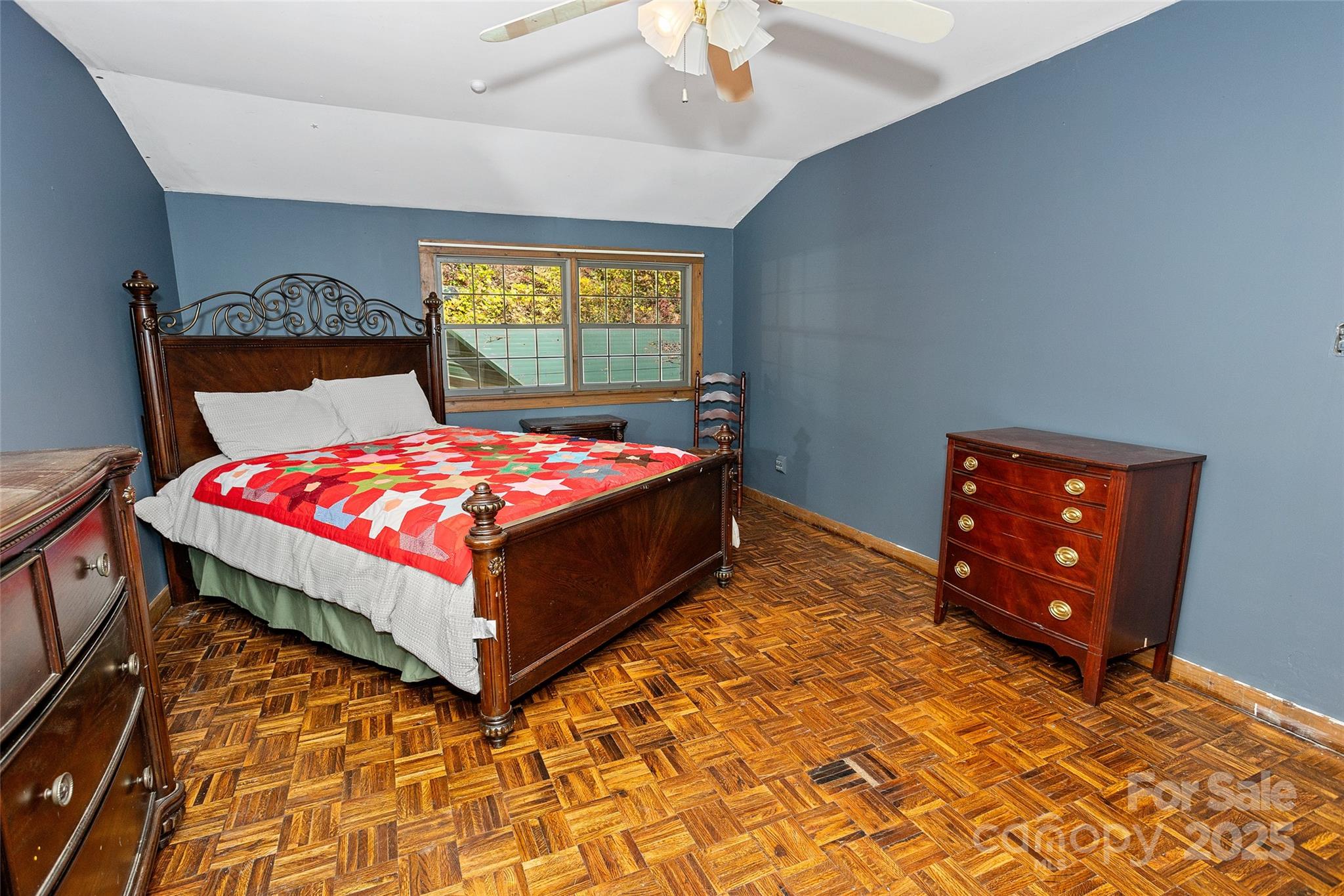 310 Log Gap Road Fairview, NC 28730 - Photo 38 of 46 a bedroom with a bed and window