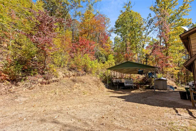 a view of car parked on the side of the road