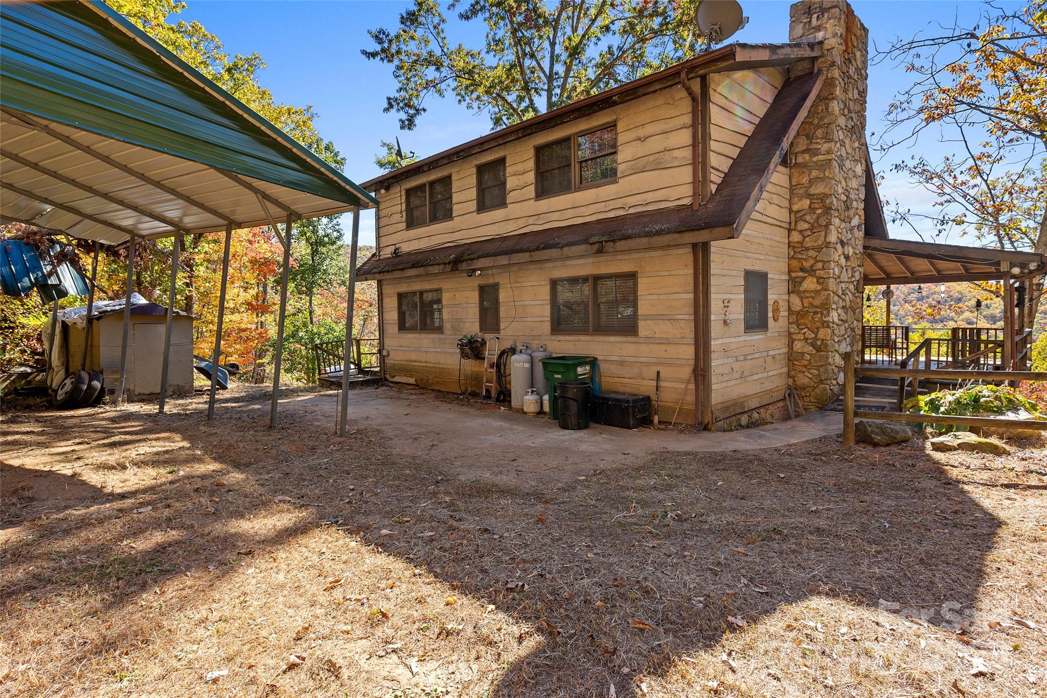 310 Log Gap Road Fairview, NC 28730 - Photo 9 of 46 a view of a house with a patio