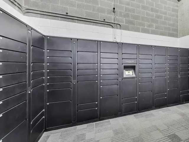 a kitchen with a sink a stove and cabinets