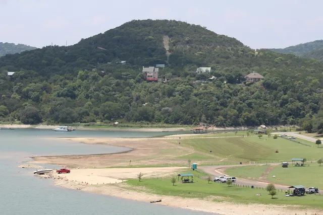 a view of a lake with a mountain