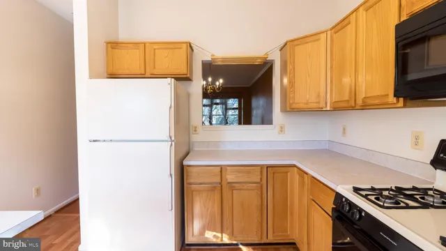 a balcony with wooden floor and fence