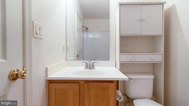 a view of entryway with wooden floor and window