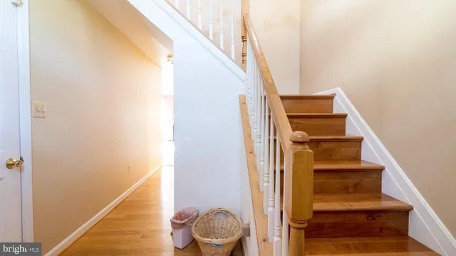 a view of entryway with wooden floor