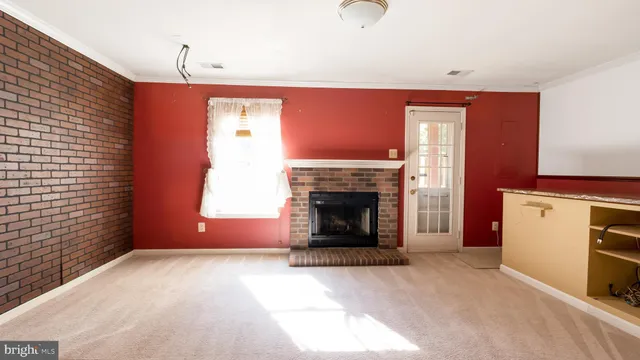 a view of a livingroom with a fireplace