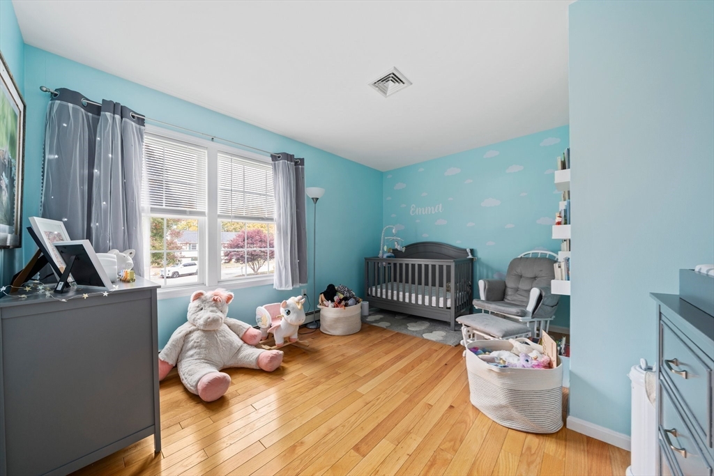 10 Crossman Circle Abington, MA 02351 - Photo 20 of 38 a bed room with a bed and a couch