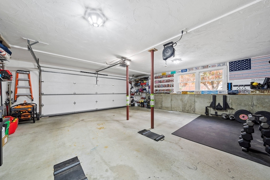 10 Crossman Circle Abington, MA 02351 - Photo 28 of 38 a view of a garage with equipment