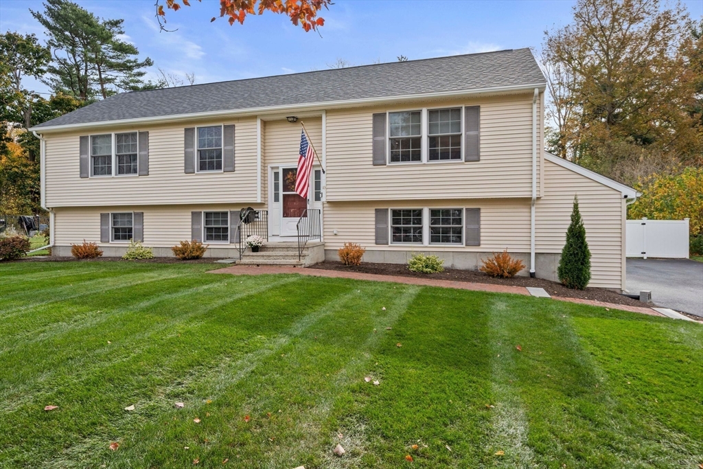 10 Crossman Circle Abington, MA 02351 - Photo 35 of 38 a front view of a house with a yard