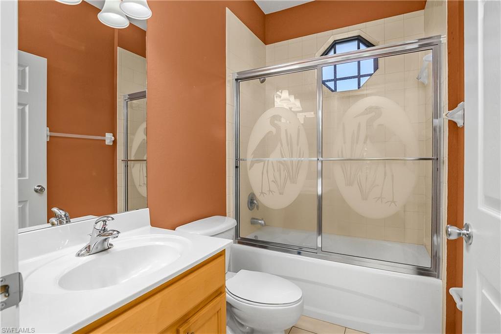 7820 Sandpine Court, Unit 2304 Naples, FL 34104 - Photo 24 of 49 a bathroom with a sink toilet and shower