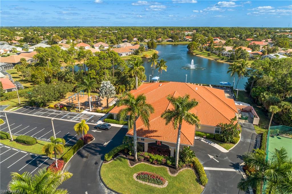 7820 Sandpine Court, Unit 2304 Naples, FL 34104 - Photo 35 of 49 an aerial view of a house with a swimming pool and outdoor seating
