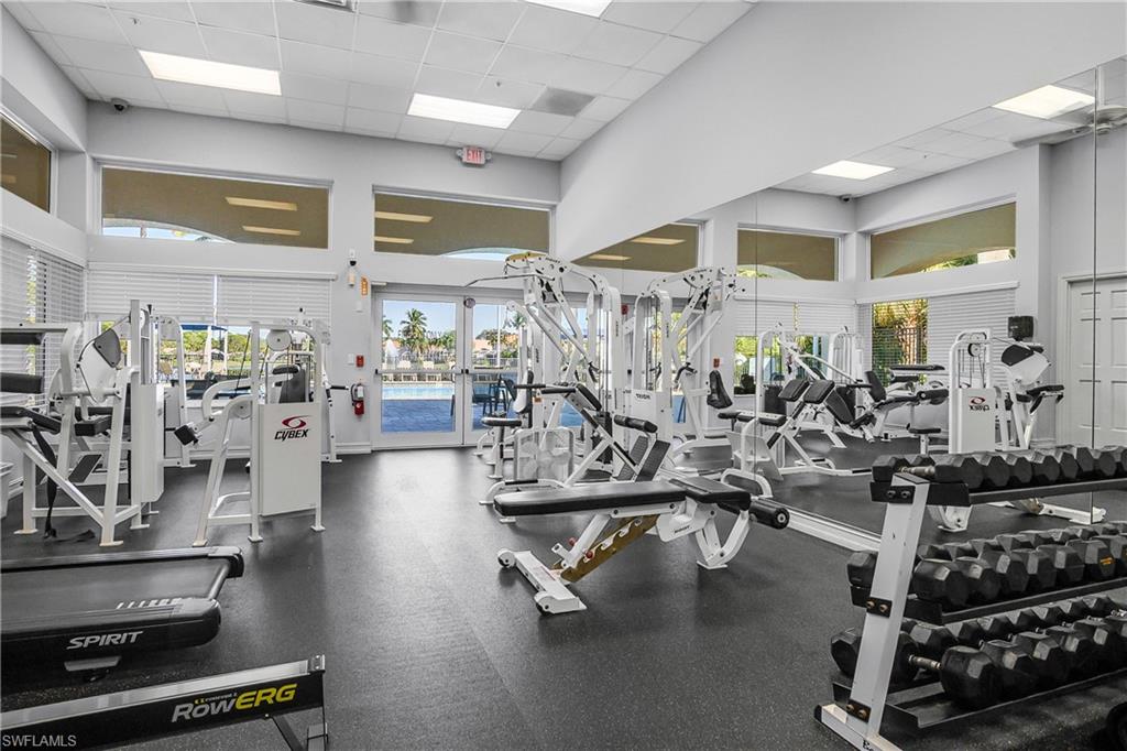 7820 Sandpine Court, Unit 2304 Naples, FL 34104 - Photo 42 of 49 a view of a room with gym equipment