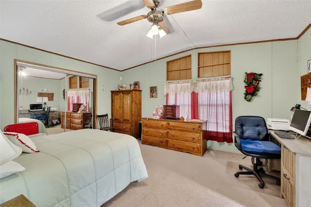 a bedroom with a bed and furniture