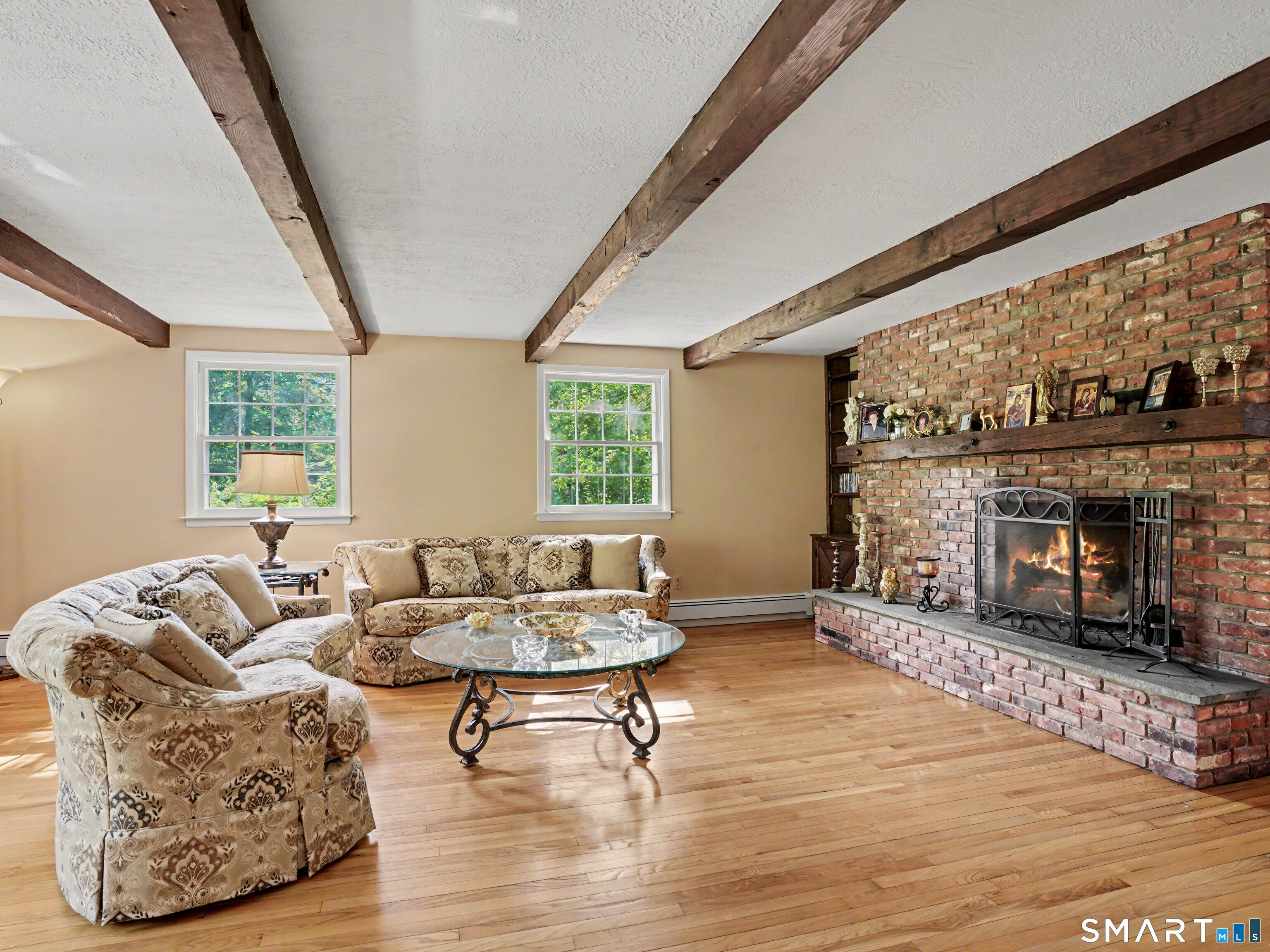 15 Flat Rock Drive Ridgefield, CT 06877 - Photo 6 of 39 a living room with furniture and a fireplace