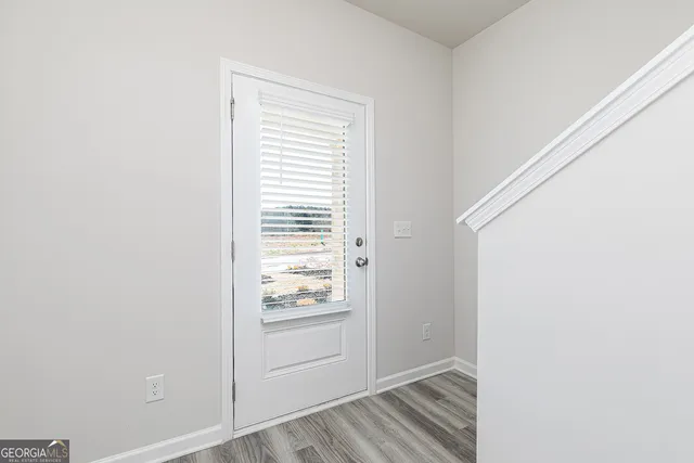 a view of walk in closet with window