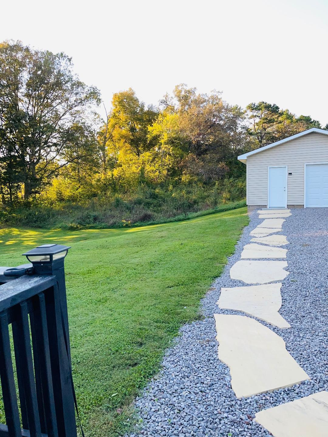 2486 McCleary Road Sevierville, TN 37876 - Photo 11 of 12 Garage walkway