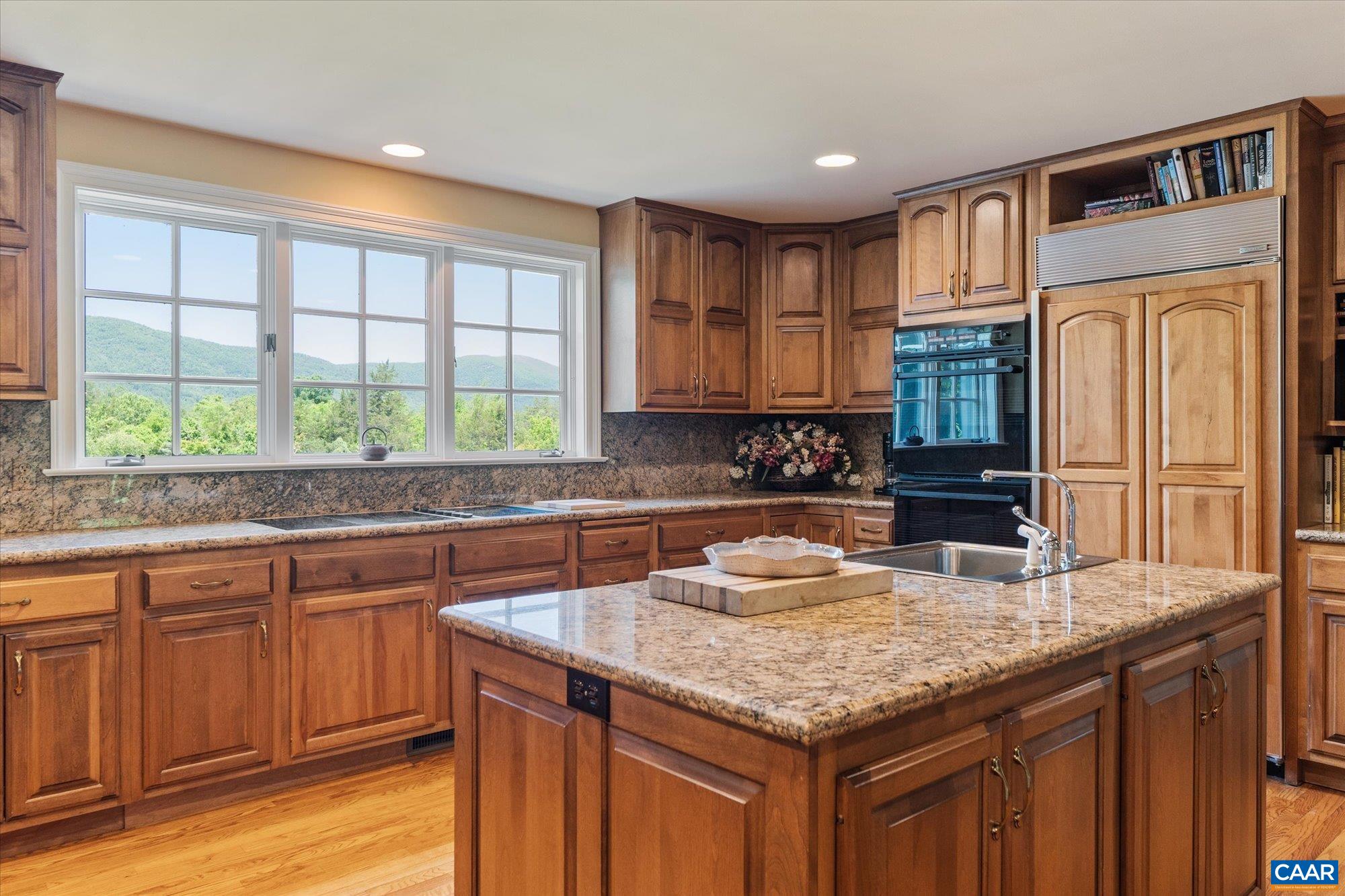 5190 Sugar Ridge Road Crozet, VA 22932 - Photo 28 of 69 a kitchen with granite countertop a sink and a window