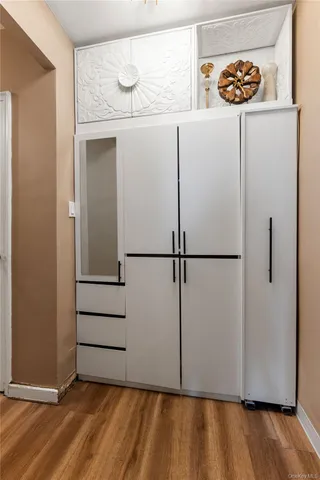 a view of small space with wooden floor