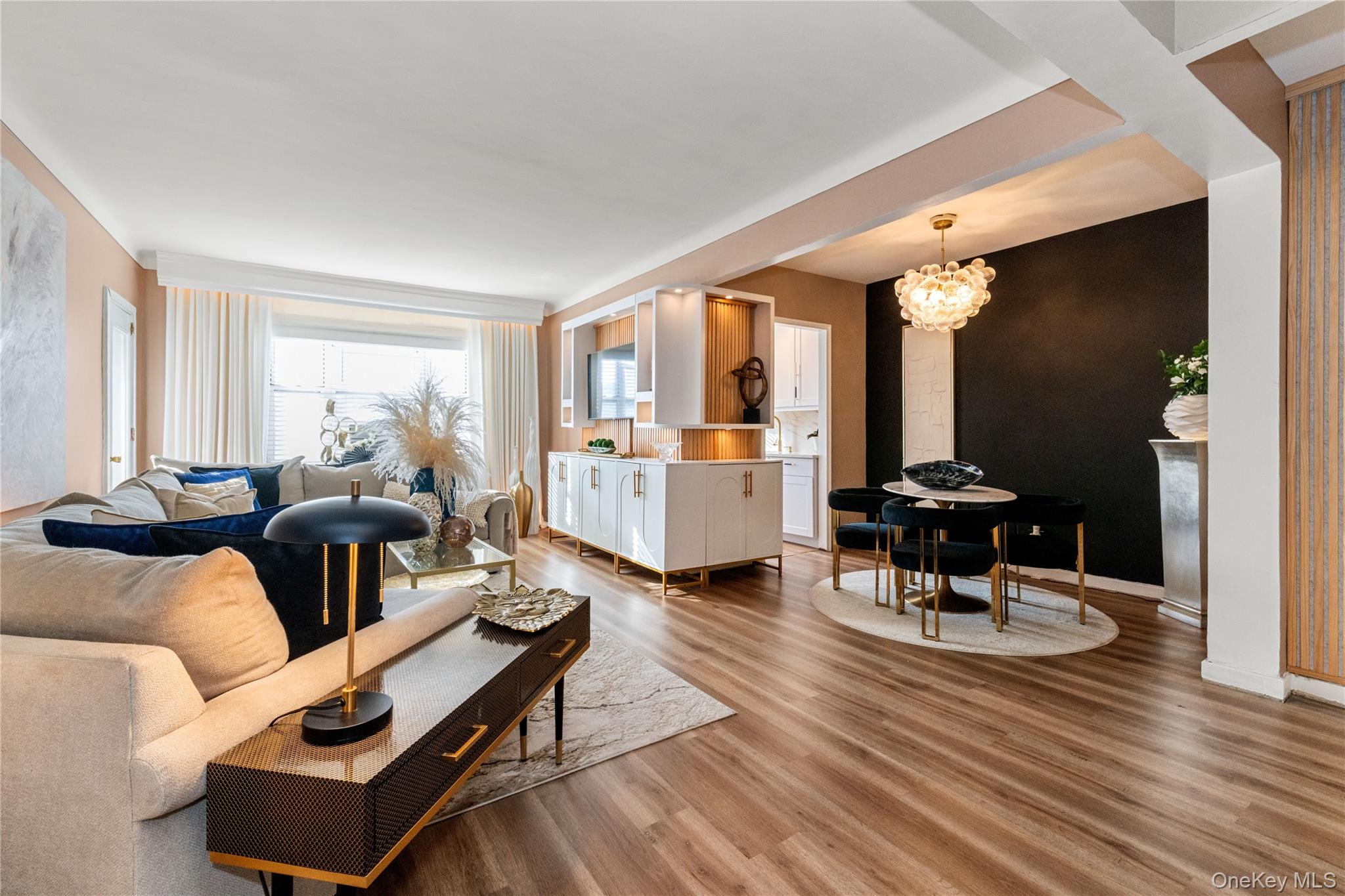 83-33 Austin Street, Unit 3D Queens, NY 11415 - Photo 4 of 20 a living room with furniture and wooden floor