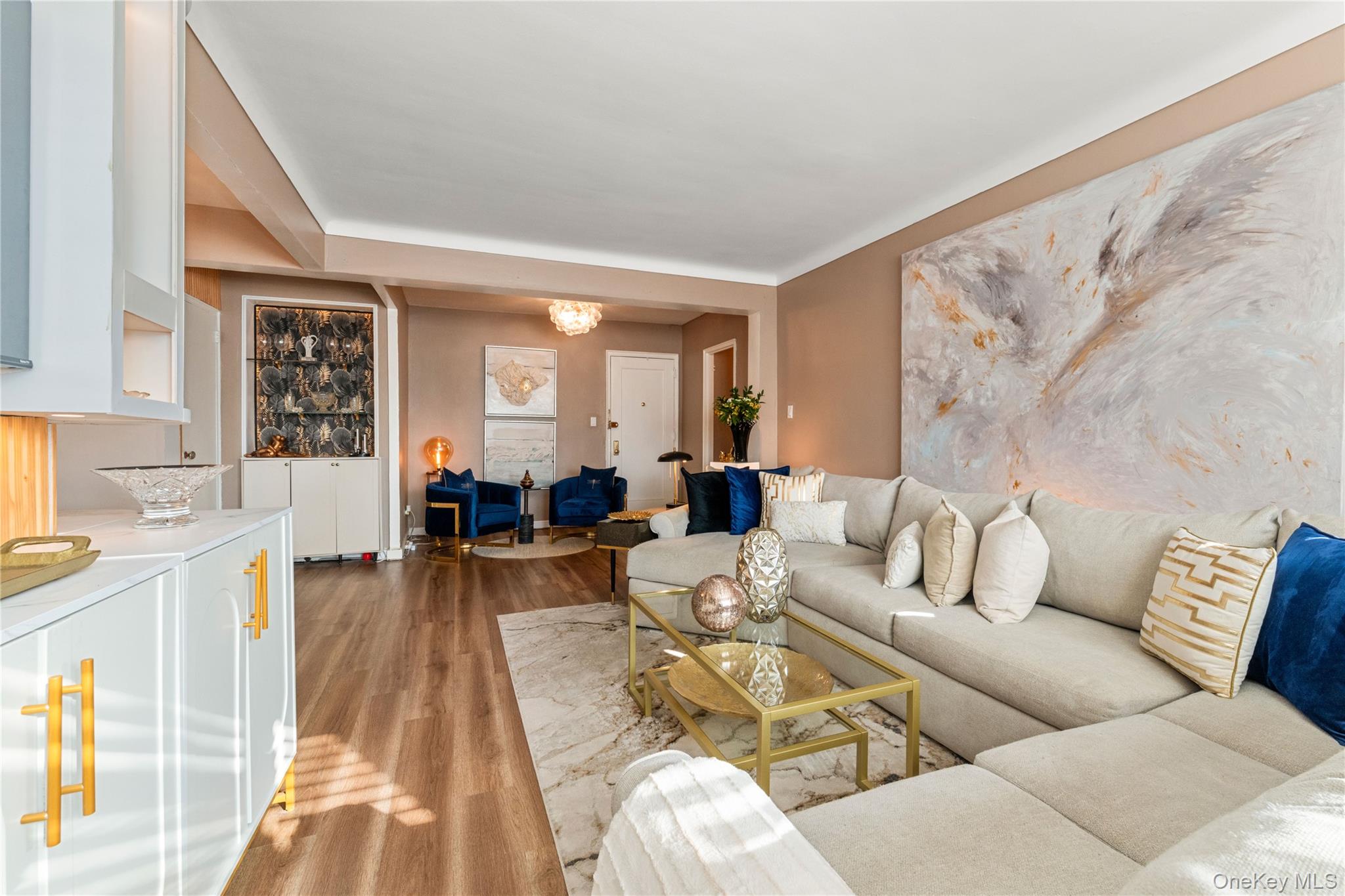 83-33 Austin Street, Unit 3D Queens, NY 11415 - Photo 8 of 20 a living room with furniture and a couch