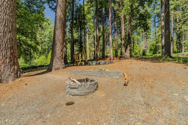 a view of balcony with deck and wooden floor