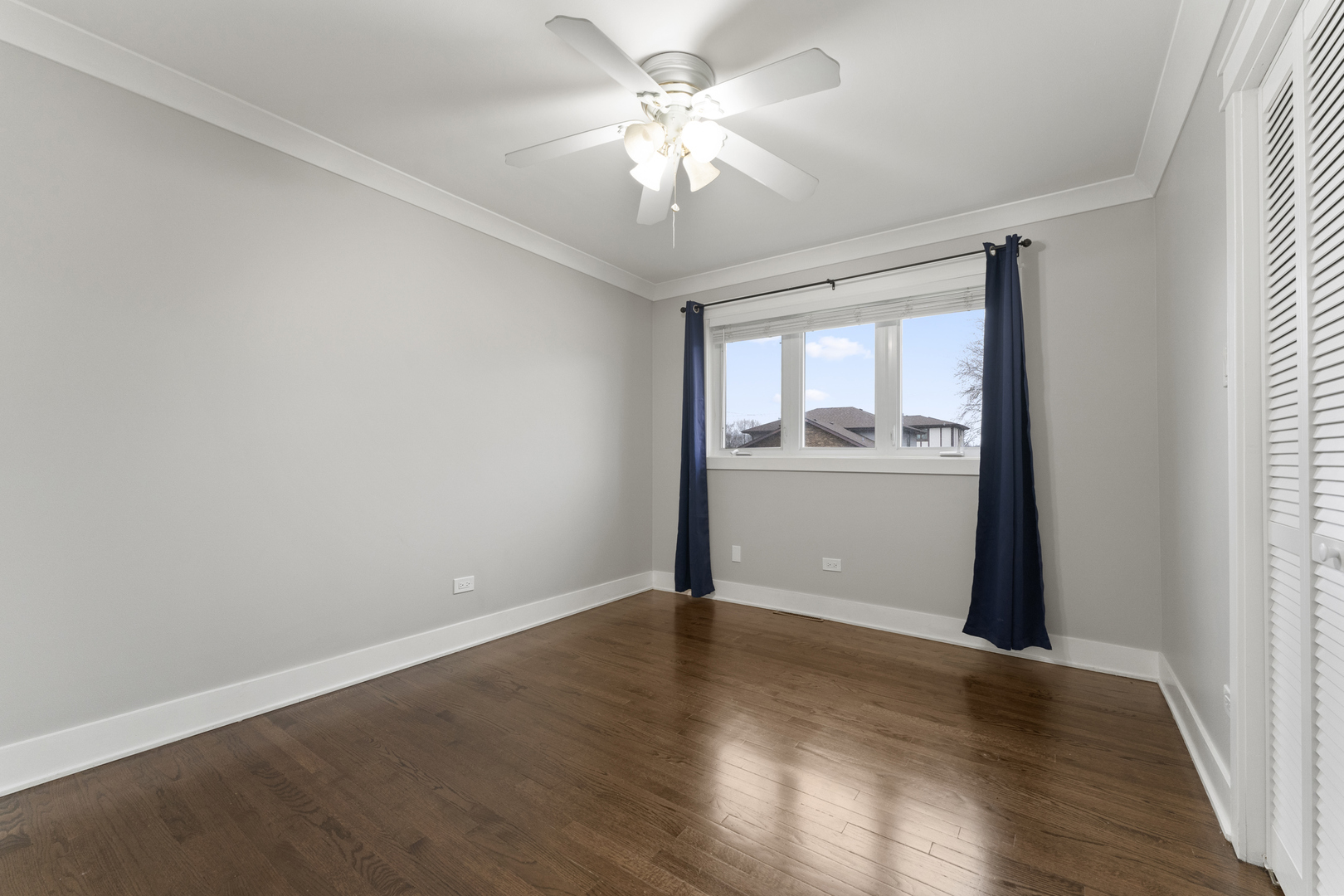 8306 South 82nd Avenue Justice, IL 60458 - Photo 23 of 40 wooden floor in an empty room with a window