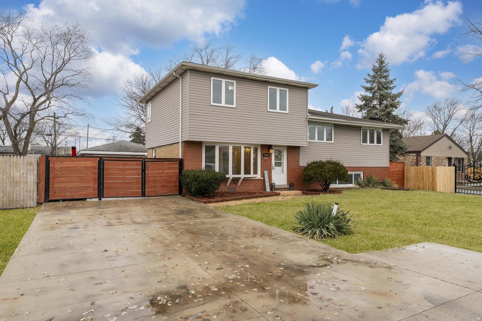 8306 South 82nd Avenue Justice, IL 60458 - Photo 3 of 40 a view of a house with a yard