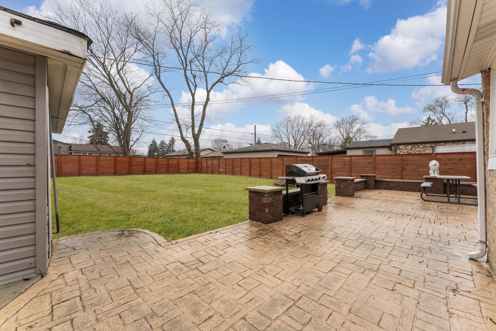 8306 South 82nd Avenue Justice, IL 60458 - Photo 33 of 40 a view of a backyard with sitting area