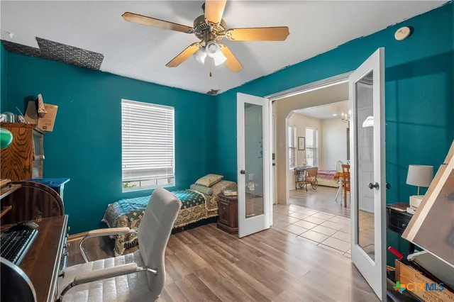 a living room with furniture and a window