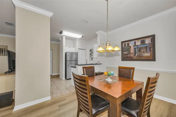 a view of a dining room with furniture