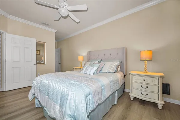 a bedroom with bed and window
