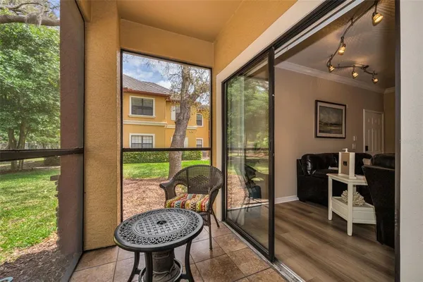 a view of a livingroom with furniture and entryway