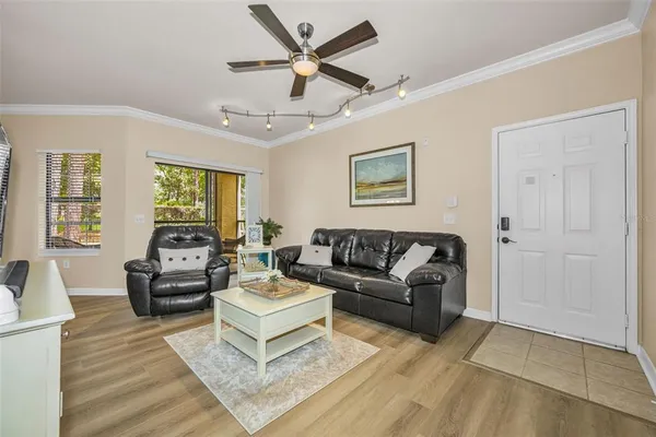 a living room with furniture and a window