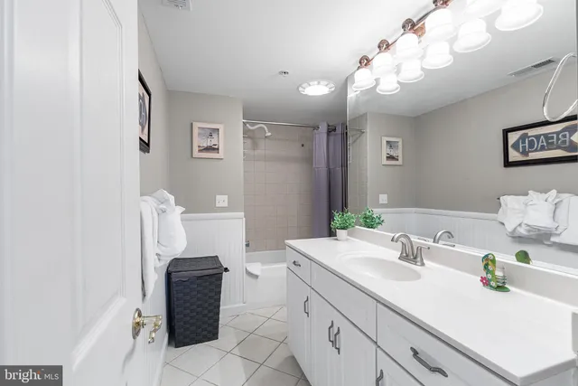 a bathroom with a shower and a tub