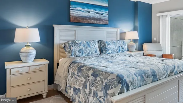 a living room with a bed and furniture